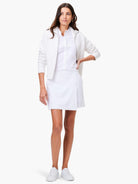 White faux wrap skort;  model wears matching white top & jacket.