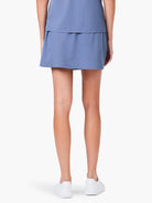 Dusty blue skort, rear view.  Short length, simple styling.
