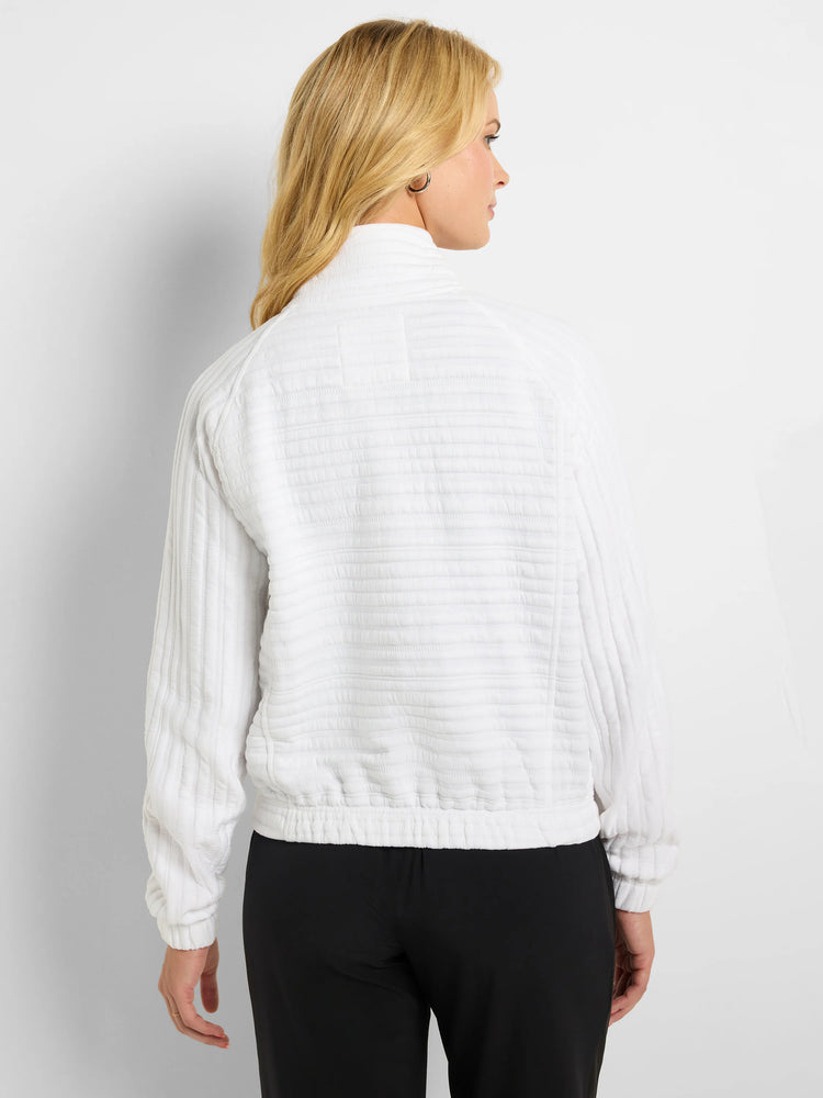 White textured zip-front jacket with vertical stripes.  Long sleeves, elasticized hem.