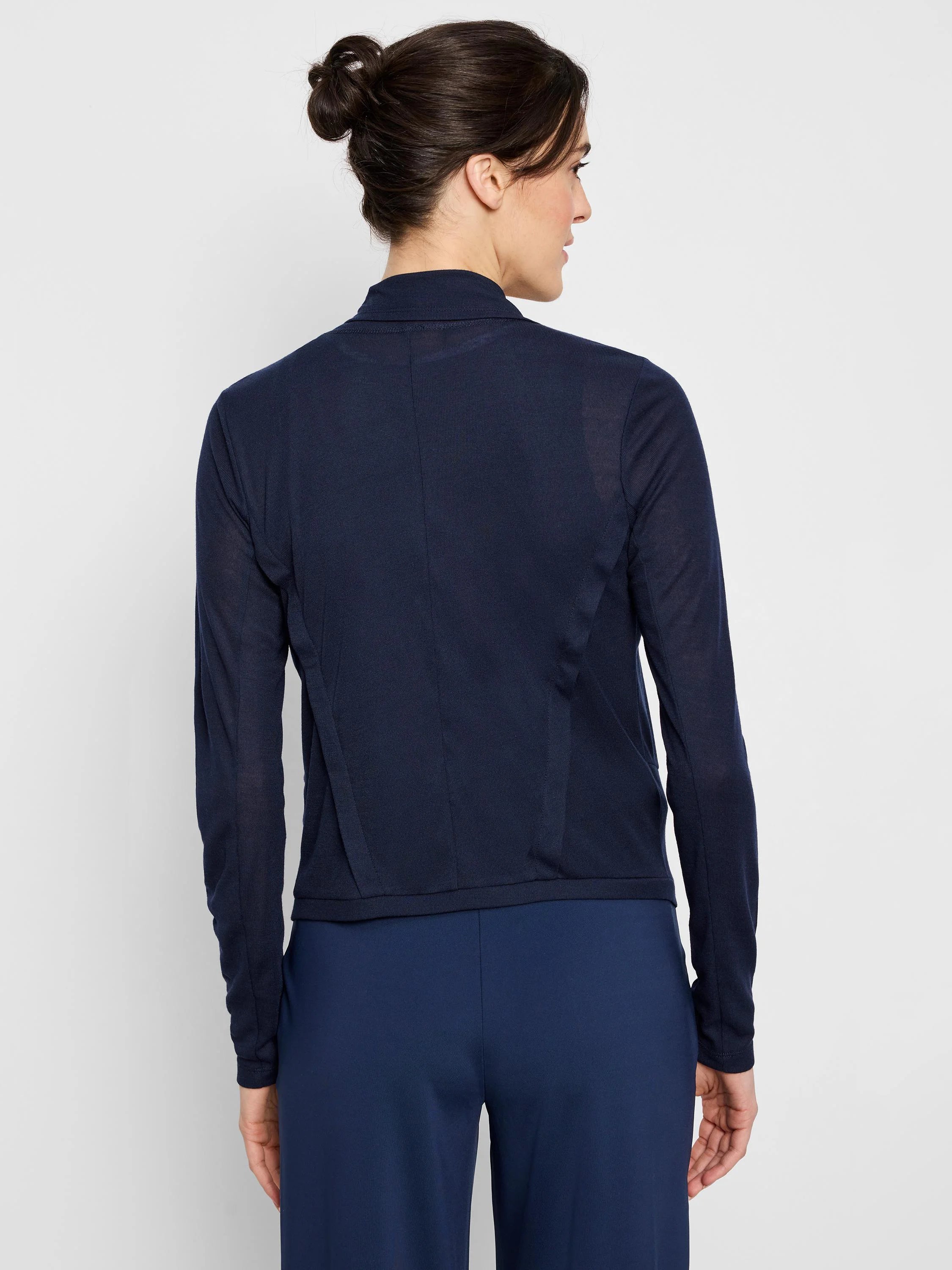 Navy blue, long-sleeved cardigan; snap front; fitted silhouette.