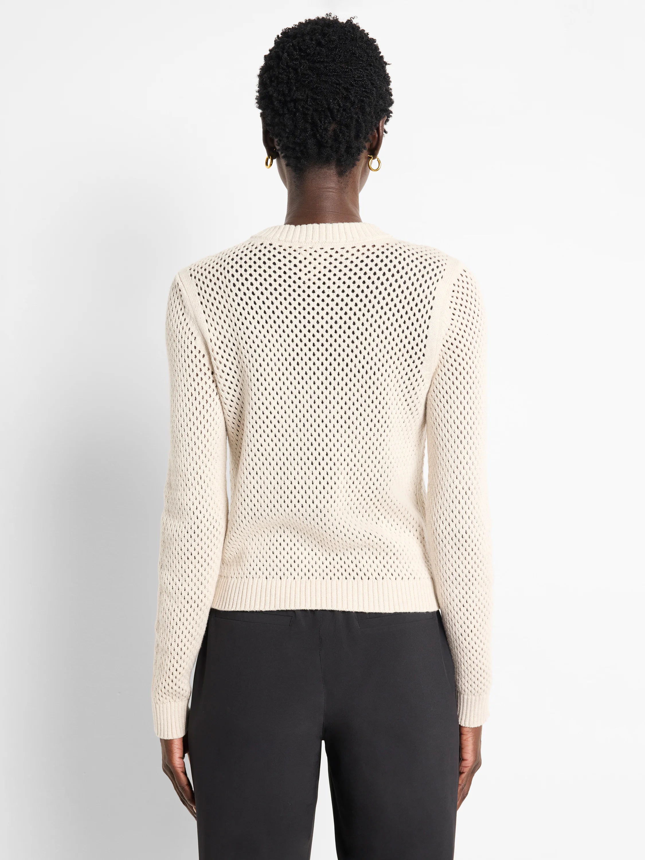 Off-white zip-front mesh cardigan.  The mesh pattern is evenly spaced.