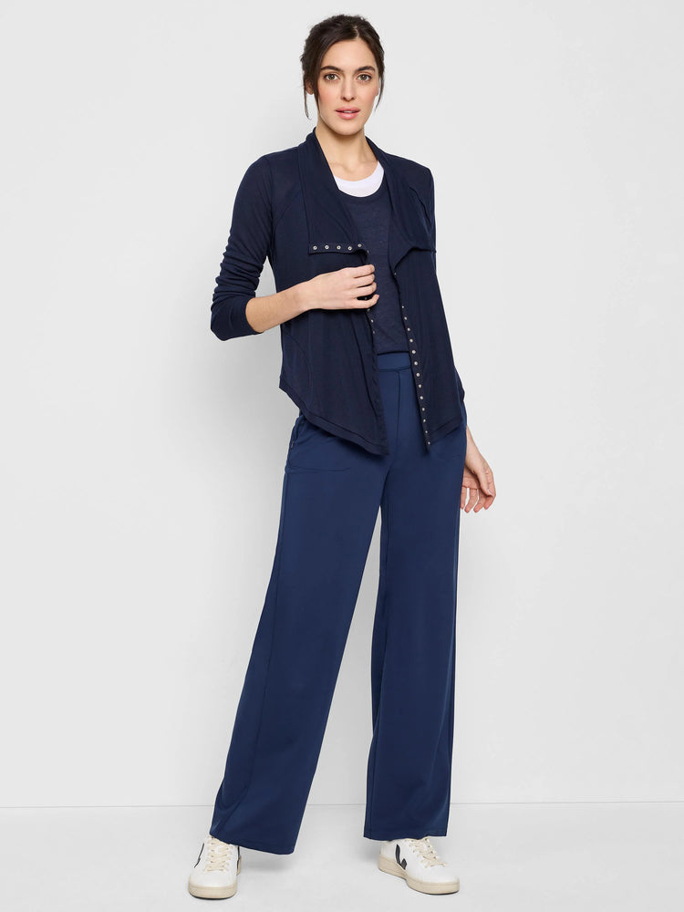 Navy blue wide-leg pants.  Model shown wearing them with a navy blue cardigan.  Pants have pockets.