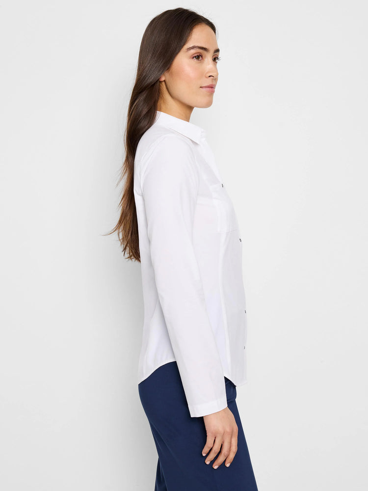 White long-sleeve collared shirt, button front, shown on a model.  Small dark buttons.