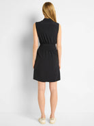 Black sleeveless mini dress, collared neckline, fitted waist.