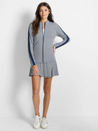 White & navy gingham zip-front jacket.  Sleeves feature navy side panels.  A-line mini skirt hem.