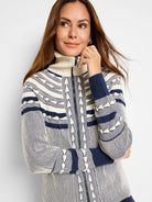 Fairisle zip-front cardigan in cream and navy blue.  Features horizontal stripes and a textured pattern.  High neck and...