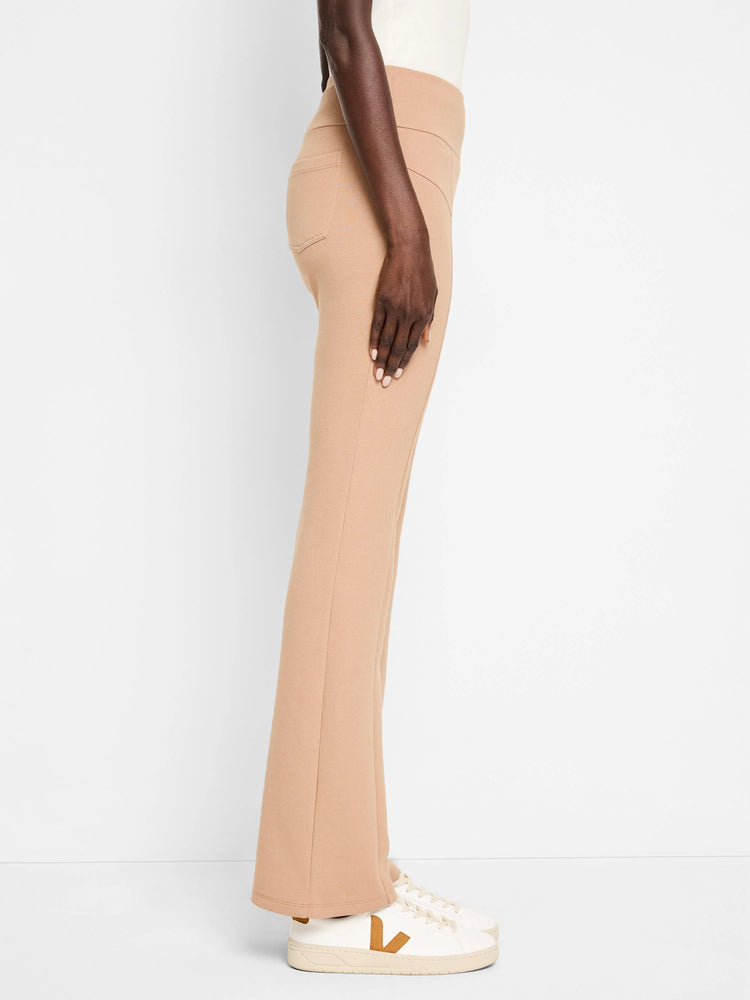 Light brown bootcut pants; side view shows seamed detail.