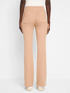 Beige bootcut pants; back view shows two back pockets.
