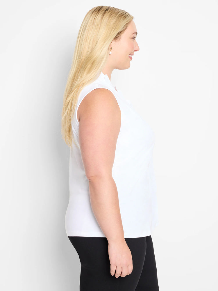White sleeveless tank top with a standing ruffled collar, worn by a woman shown in profile.