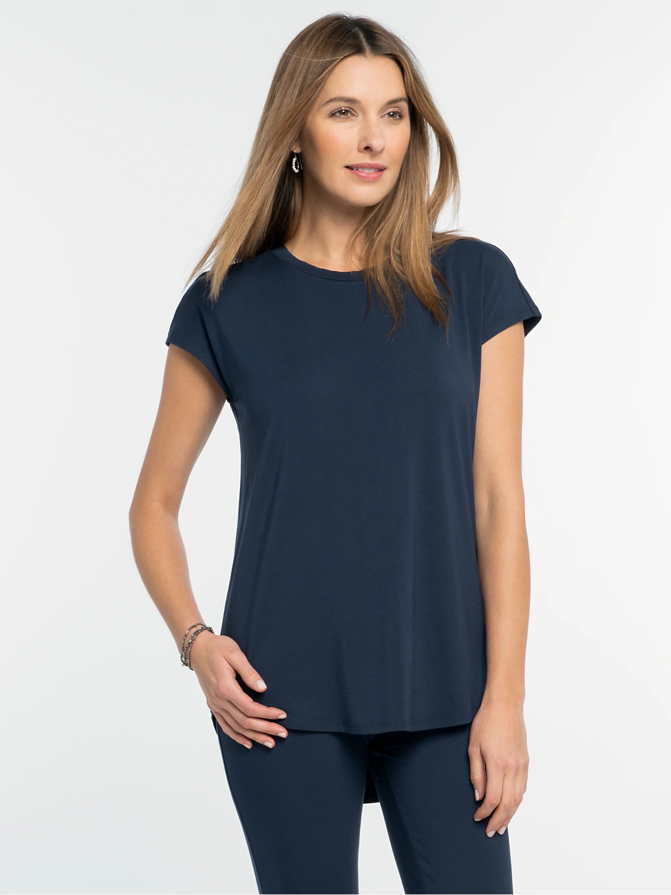 Navy Eaze Tee: round neck, short cap sleeves, and a relaxed fit in smooth fabric.