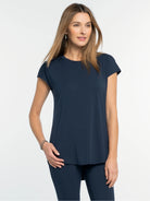 Navy Eaze Tee: round neck, short cap sleeves, and a relaxed fit in smooth fabric.