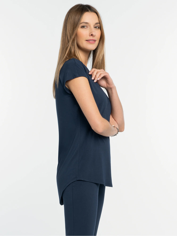 Navy blue, loose-fit tee with a rounded neck, short sleeves, and a curved hem.