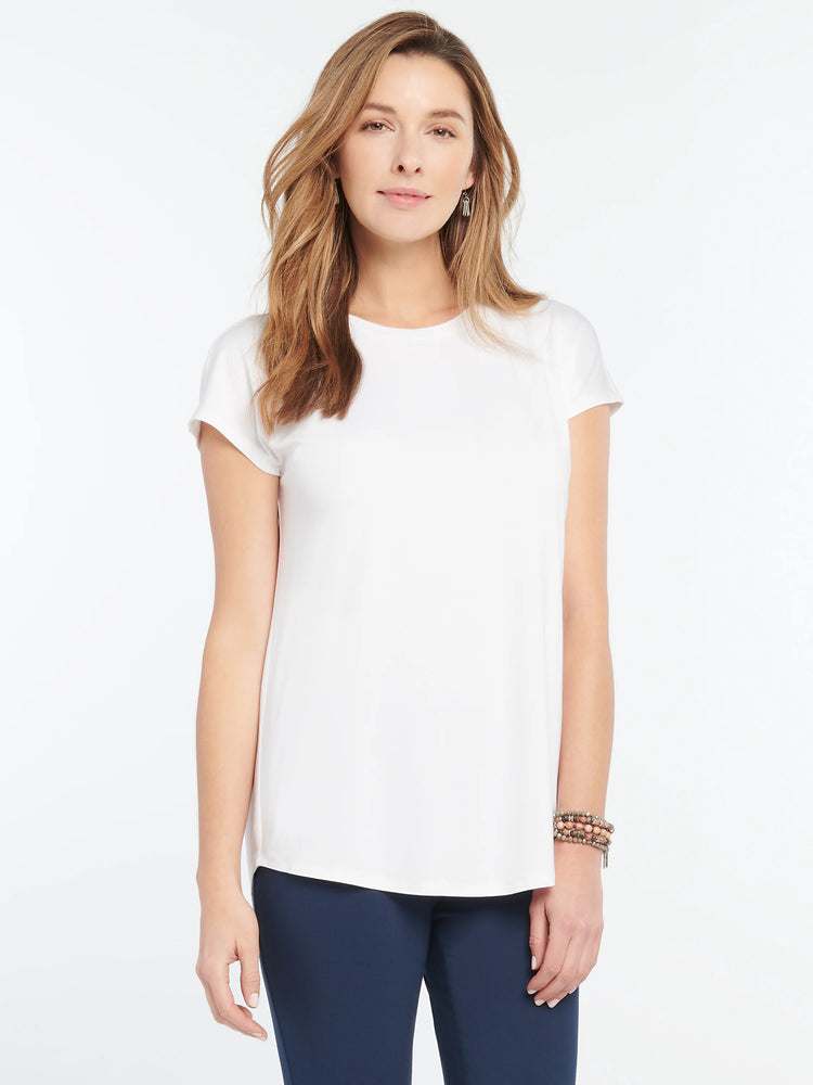 White Eaze Tee on model. Short sleeve, crew neck, relaxed fit, straight hem.