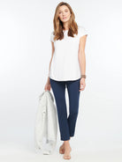 White Eaze Tee with short sleeves, a round neckline, and a relaxed fit with a curved hem.