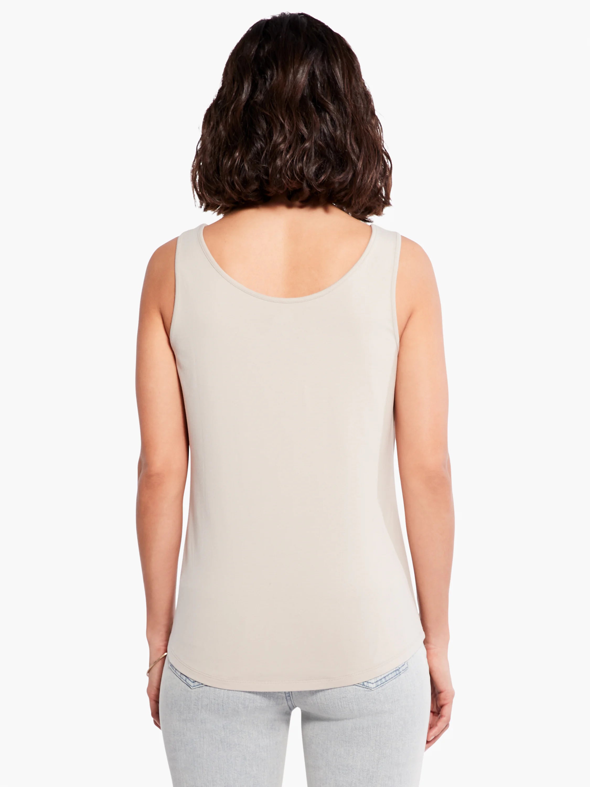 Light beige sleeveless tank top, back view. Features a scoop neck and curved shirttail hem.
