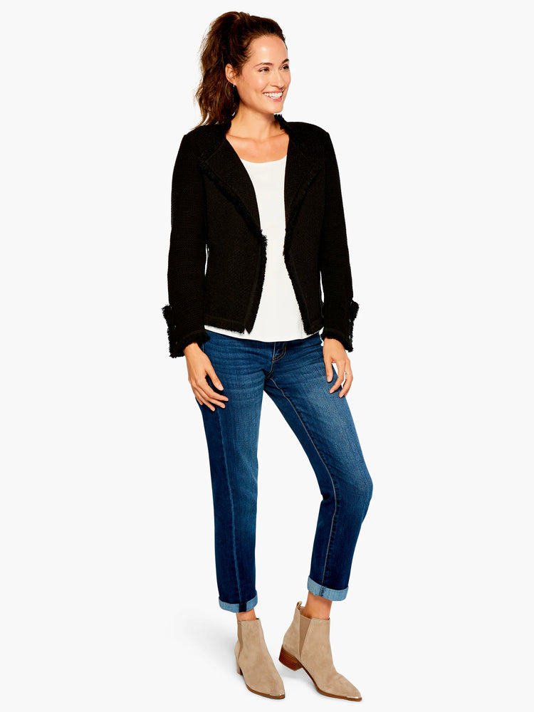 White tank top with a rounded shirt-tail hem.