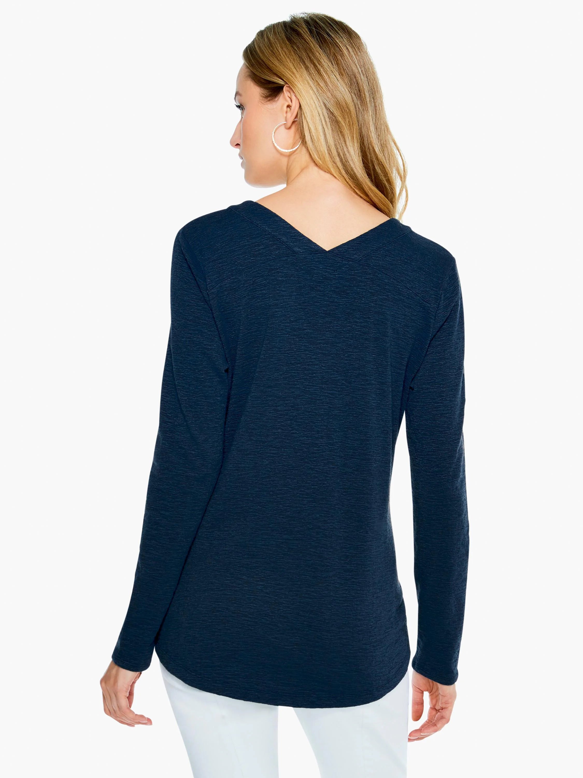 Dark navy blue, long-sleeved top with a V-neck.  Textured fabric.