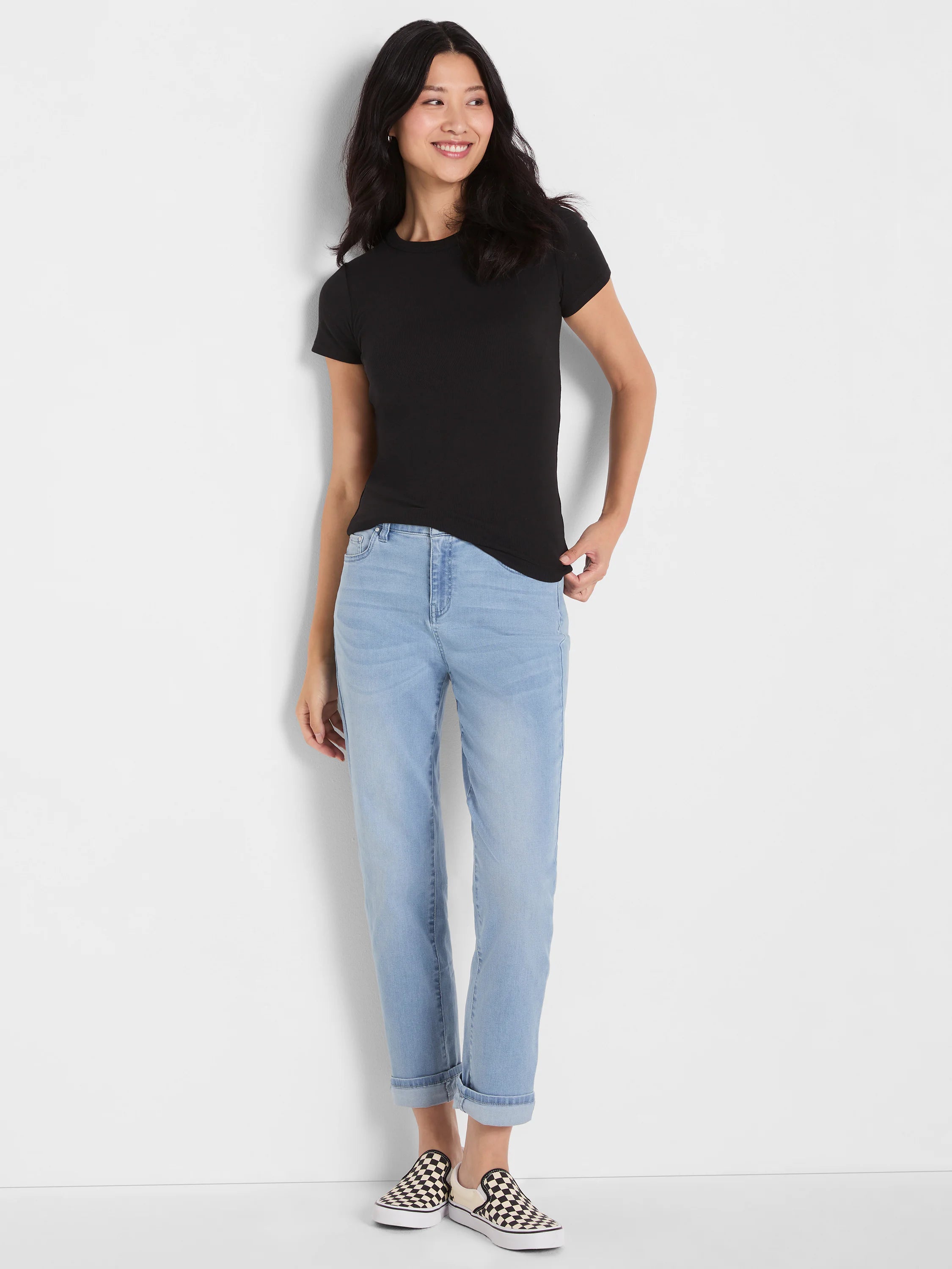 Black ribbed knit short sleeve crew tee with a crew neck and fitted silhouette.