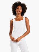 White tank top with a square neckline and wide straps.