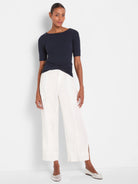 Dark navy ribbed boatneck tee with elbow-length sleeves.