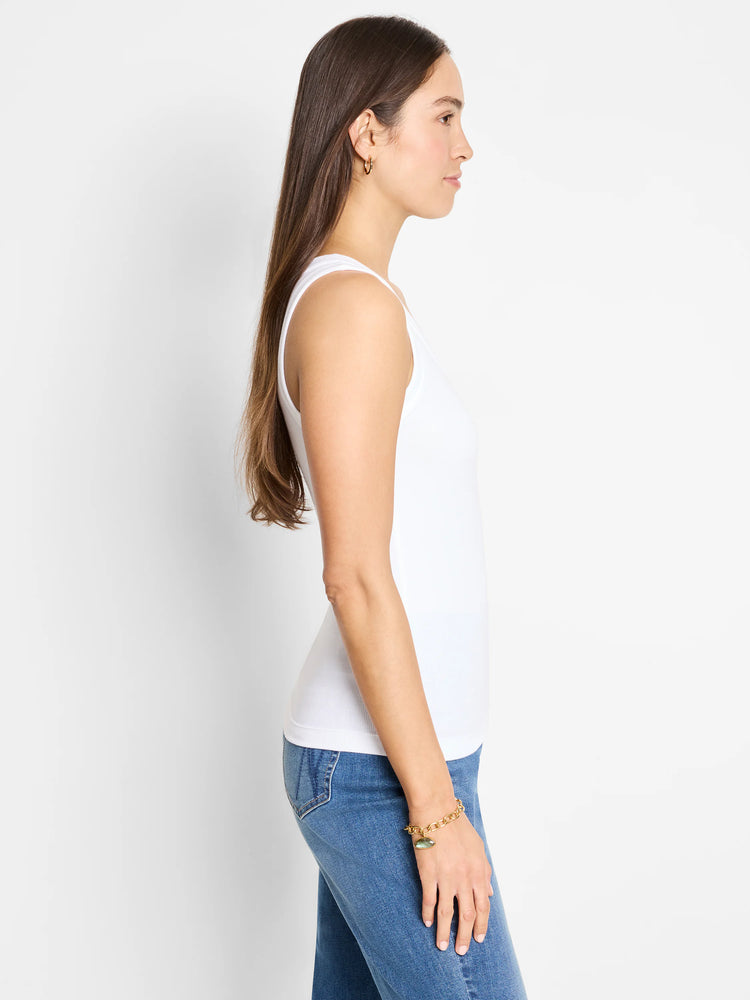 White ribbed scoop tank on a woman.