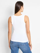 White ribbed scoop tank top, seen from the back on a model. Displays clear vertical ribbing and a rounded back neckline.