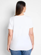 White crew neck t-shirt with short sleeves on a woman, back view.