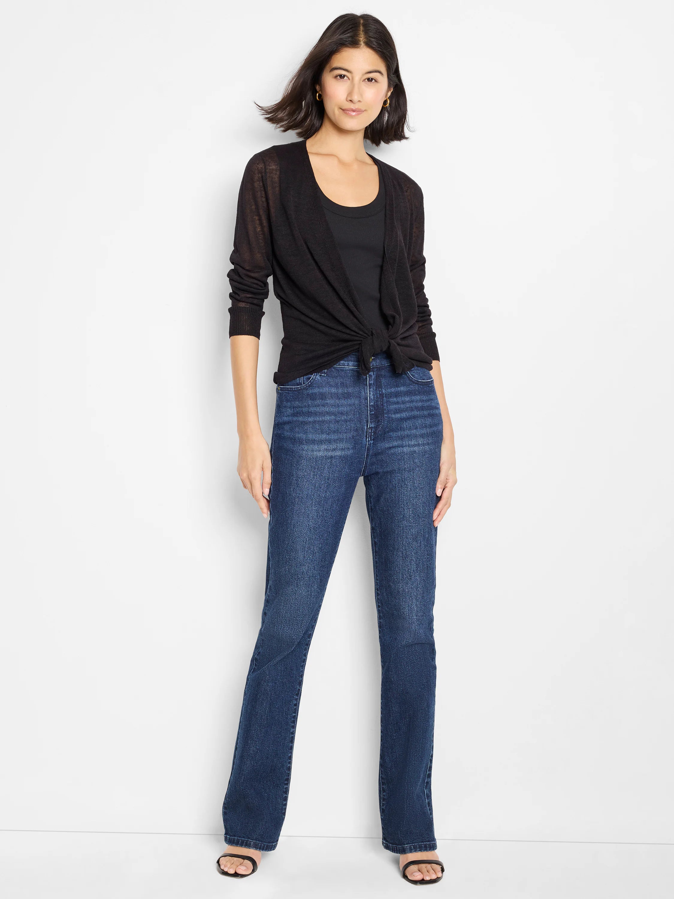 Black lightweight open-front cardigan with long sleeves, shown tied at the waist over a black tank top.