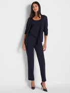 Navy monochromatic outfit featuring relaxed straight ankle pants, a scoop-neck tank, and a sheer, three-quarter sleeve.