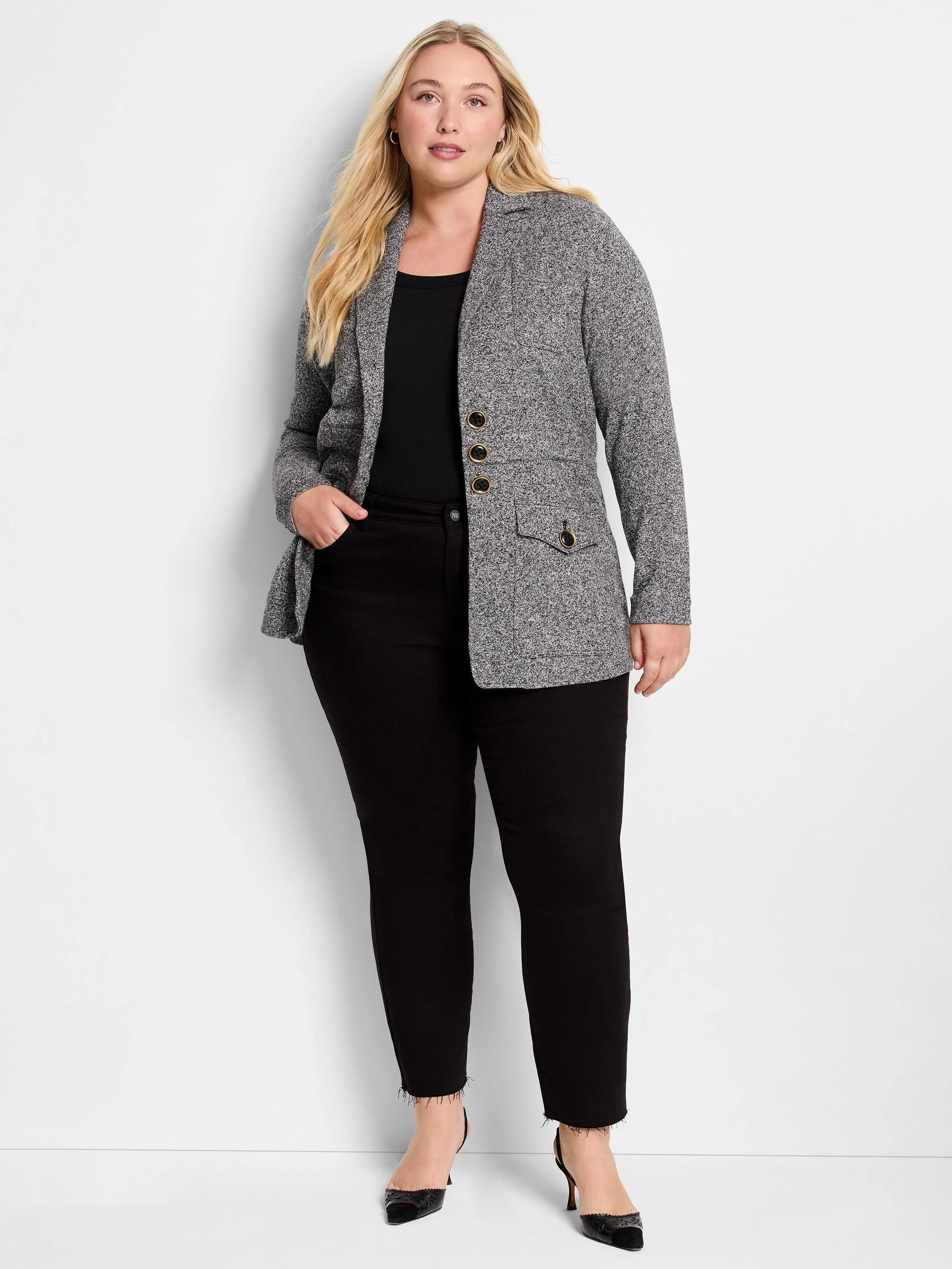Speckled grey knit blazer with lapels, three gold buttons, and two buttoned flap pockets.