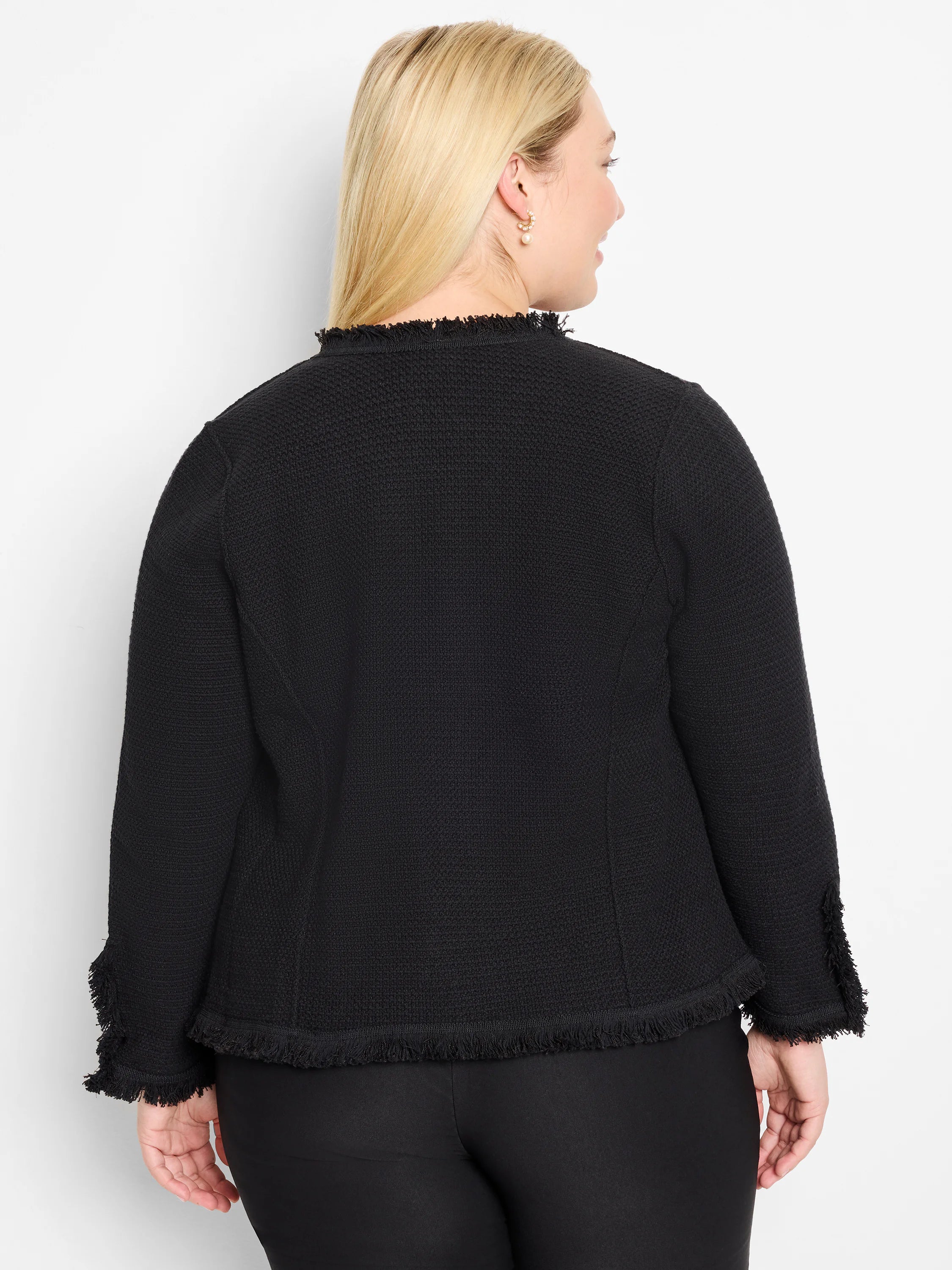 Black mix knit jacket with fringe detail at the collar, cuffs, and hem.