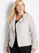 Speckled light gray knit jacket with fringe on collar, front, hem, and cuffs.