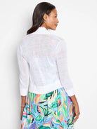 White sheer bolero cardigan with 3/4 sleeves and ribbed trim.