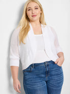 White lightweight knit bolero cardigan, open front, 3/4 sleeves with ribbed cuffs and collar.