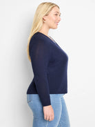 Navy blue lightweight V-neck cardigan with long sleeves, ribbed cuffs and hem.