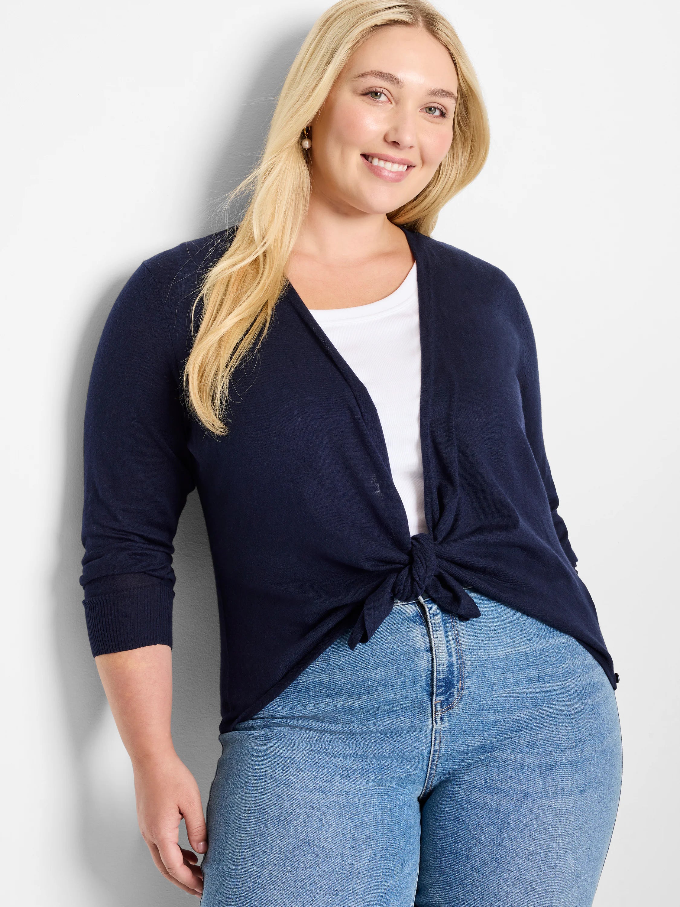 Navy 3/4 sleeve open-front cardigan, tied at the waist.