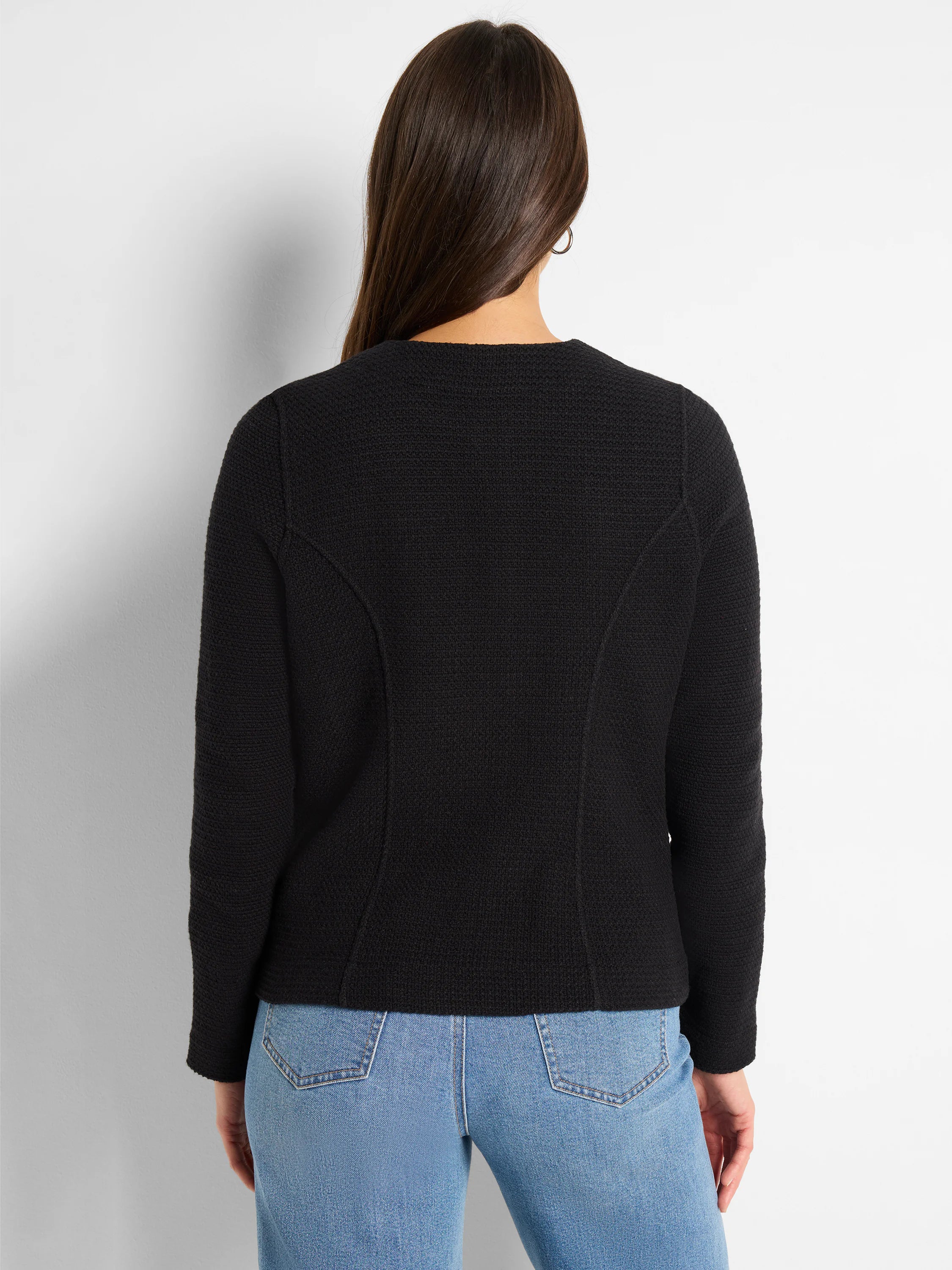 Black weave mix knit jacket, seen from behind, features a rounded neck and curved back seams.