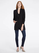 Black knit jacket, collarless, open front, long sleeves, hip-length.