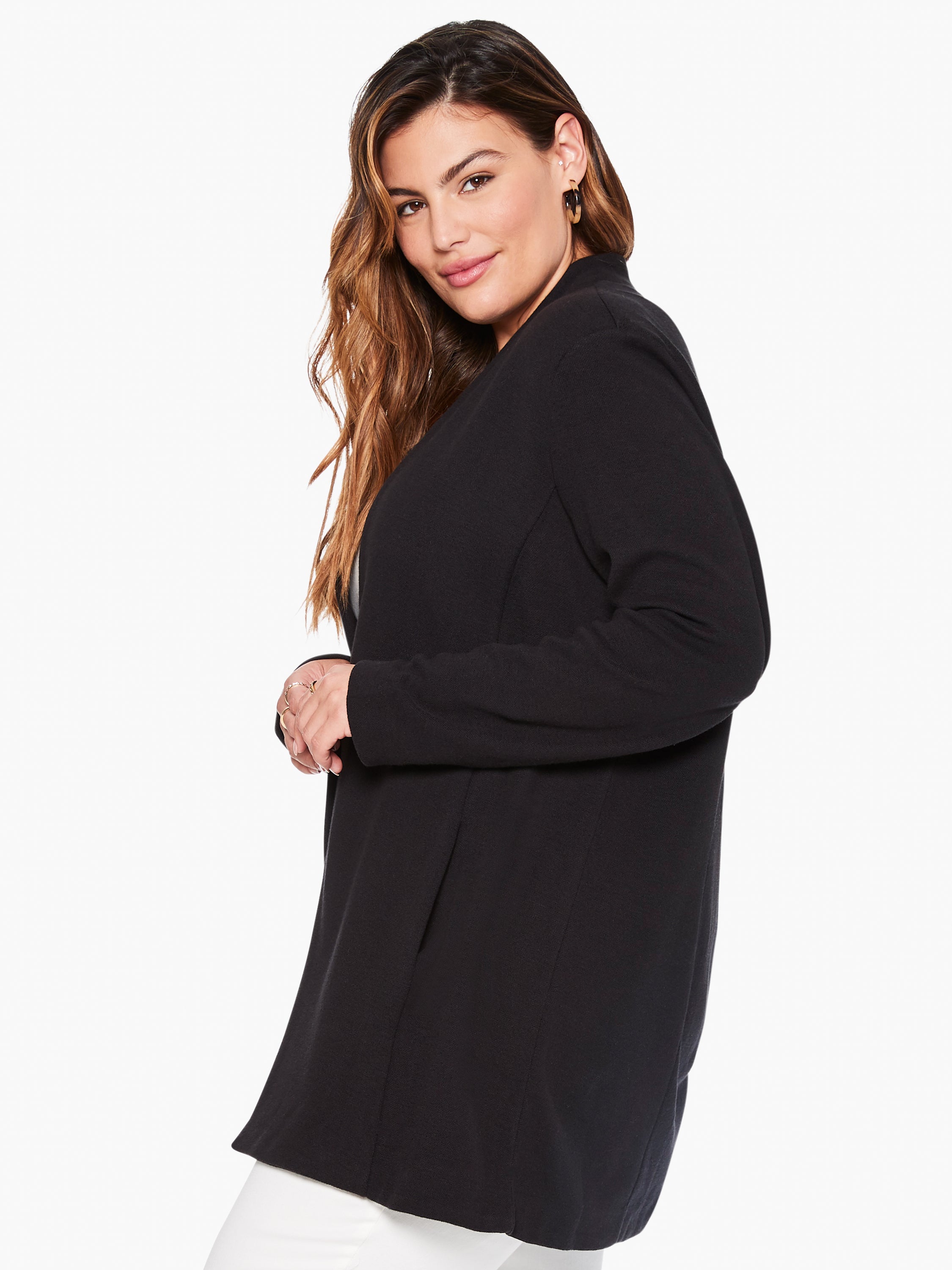 Black longline knit jacket with long sleeves and a relaxed fit.