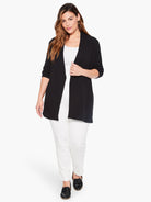 This black, relaxed-fit, long knit cardigan features a minimal front opening and ruched elbow-length sleeves.