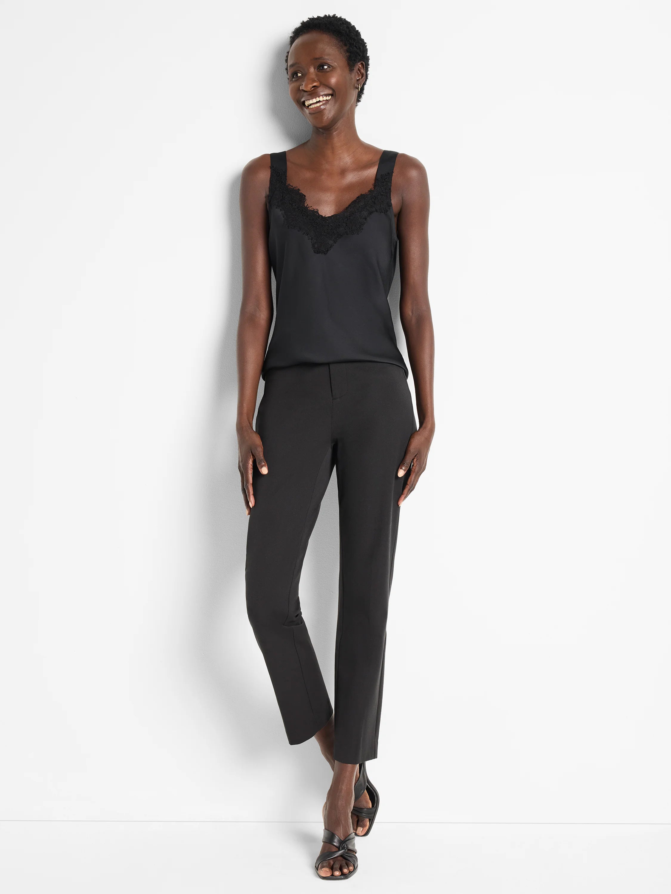 Black cami tank with black lace V-neckline.