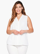 White sleeveless top, V-neckline.  Straight hem.