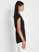Black cap sleeve top, loose fit, with a soft collar neckline and longer length.