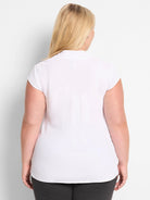 White cap sleeve top, back view, with standing collar and gathered detail at the lower back.
