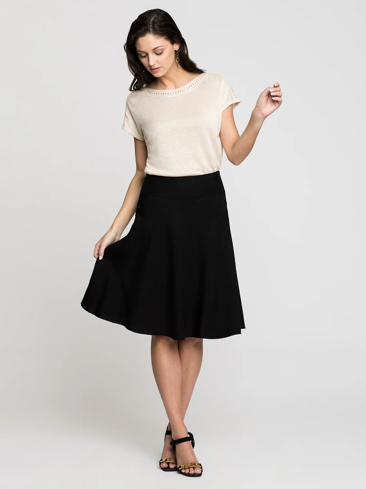 Black A-line skirt with a wide waistband, gently flared, ending just below the knee.