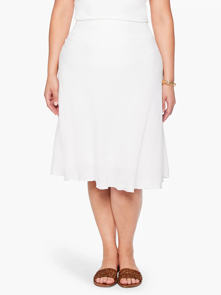 White A-line midi skirt with textured fabric, flat waistband, and subtle flare.