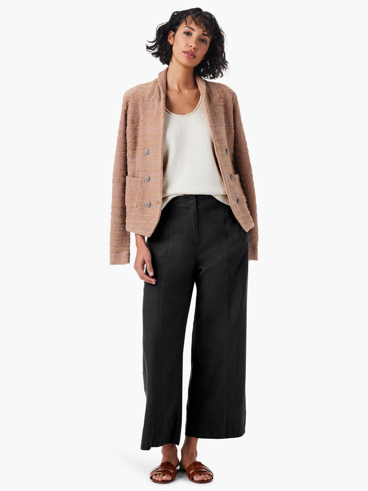 Dark charcoal wide-leg crop pants with a visible vertical seam down the front of each leg.