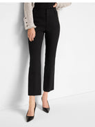 Black, cropped demi boot pants with a high waist and flat front.