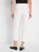Cream wide-leg crop pants, rear view. Smooth fabric, above-ankle length, no back pockets.