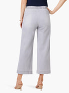 Light gray wide leg cropped jeans with an elasticized waist, back view.
